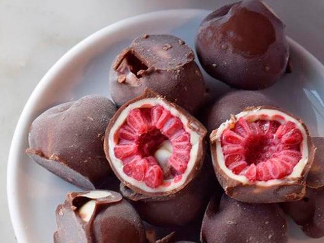 Frambuesas Congeladas FRANUI bañadas chocolate blanco y amargo (150 gr)
